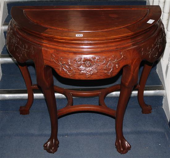 A Chinese padouk demi-lune table, W.95cm